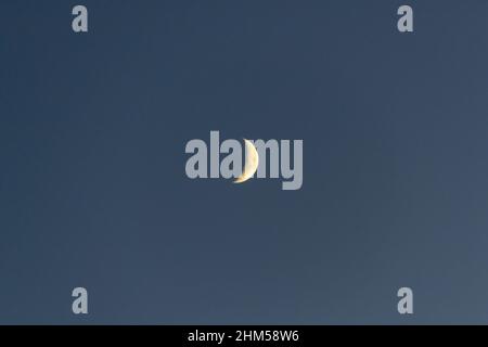 Crescent moon on the dark night sky. High quality photo Stock Photo