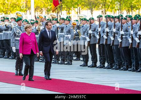 Berlin, Germany, 15.5.17, French President Emmanuel Macron and German Chancellor Angela Merkel inspect the Military Guard of Honour attend State visit Stock Photo