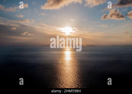 moody sunset over the island Stock Photo