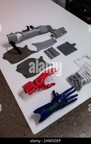 3D Printed plastic arm and hand prosthesis pieces at Zaragoza MakerSpace Stock Photo