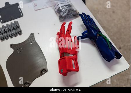 3D Printed plastic arm and hand prosthesis pieces at Zaragoza MakerSpace Stock Photo