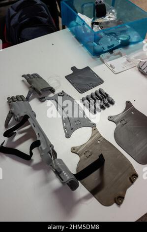 3D Printed plastic arm and hand prosthesis pieces at Zaragoza MakerSpace Stock Photo