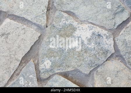 Close-up of uneven stone paving stones outdoors. High quality photo Stock Photo