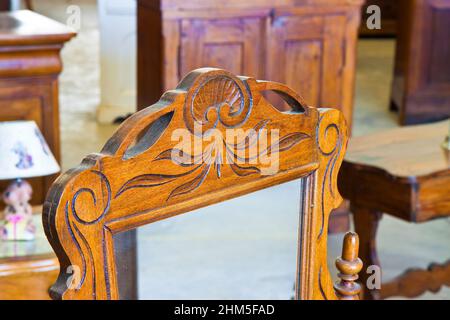 Detail of an antique italian furniture just restored; new life to old furniture Stock Photo