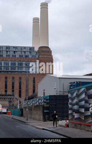 Patterned hoardings surrounding the redevelopment of Battersea Power Station and its surroundings on 3rd February 2022 in London, England, United Kingdom. Battersea Power Station is a decommissioned coal-fired power station located on the south bank of the River Thames, in Nine Elms, Battersea, an inner-city district of South West London. Now a well advanced construction site and under development, the site will become both residential and commercial. Stock Photo
