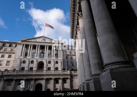 Bank of England and the Royal Exchange in the City of London on 4th February 2022 in London, United Kingdom. The City of London is a city, ceremonial county and local government district that contains the primary central business district CBD of London. The City of London is widely referred to simply as the City is also colloquially known as the Square Mile.