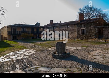 Central square with small water basin or fountain in Granadilla Extremadura at sunset Stock Photo