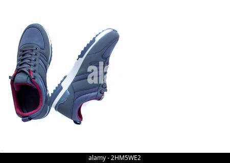 Pair of sneakers, closeup photo of sneakers isolated on white background. Stock Photo