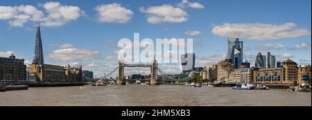 London, England - August 2022: Panoramic view of Tower Bridge and the River Thames. On the left is The Shard tower. Stock Photo