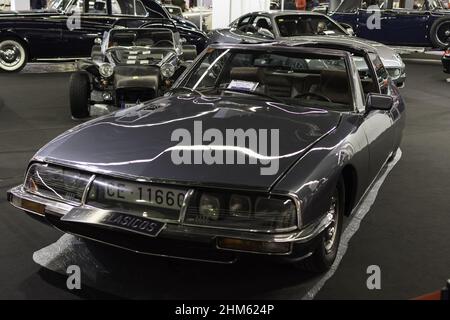 A Citroen SM with big engine in the street Stock Photo