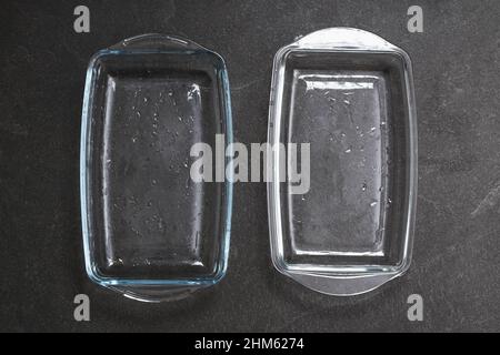 A baking dish cleaned from a thick layer of carbon. Glassware for baking after washing with a steam cleaner. Stock Photo