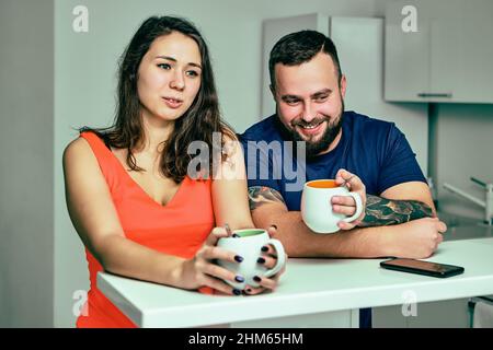 Employees are talking during coffee break in office. Stock Photo