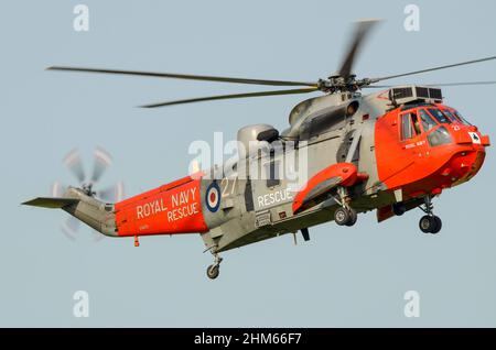 Westland WS-61 Sea King HU5 rescue helicopter XV673 of Royal Navy 771 Naval Air Squadron landing at RAF Waddington airshow, Lincolnshire, UK Stock Photo