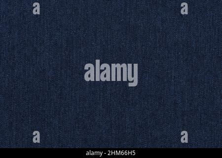 Blue jeans texture. Dark blue denim background. Stock Photo