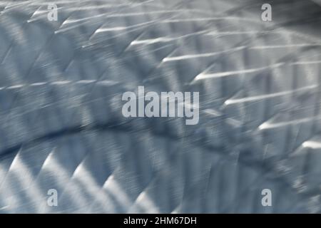 Abstract blue toned shiny metal macro, industrial background concept, motion blur Stock Photo