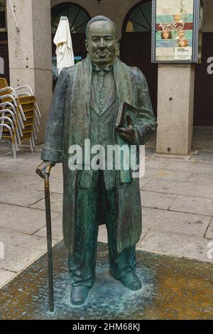 Statue of the writer Antonio Machado in the Plaza Mayor of Segovia, in Spain  Stock Photo