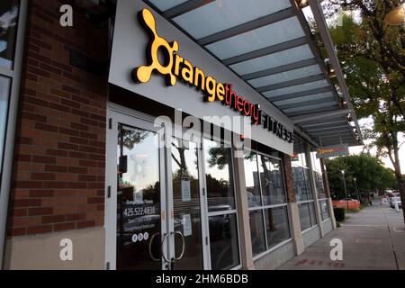 Redmond, WA USA - circa August 2021: Angled view of an Orange Theory Fitness center in the downtown area. Stock Photo