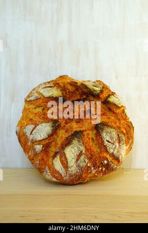 Loaf of crusty miracle overnight no knead bread Stock Photo