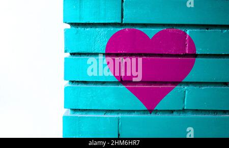 Illustration of a cyan brick wall with painted purple heart on it Stock Photo
