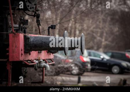 Picture of a railroad train buffer, old, rusty and neglected. A buffer is a part of the buffers-and-chain coupling system used on the railway systems Stock Photo