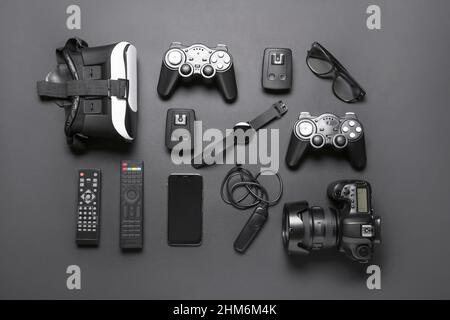 Set of modern gadgets on dark background Stock Photo