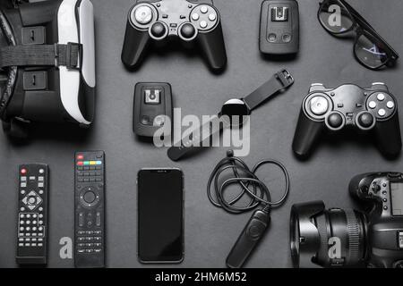 Set of modern gadgets on dark background Stock Photo