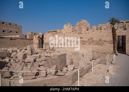 Ancient Temple of Karnak in Luxor - Ruined Thebes Egypt. Walls, obelisks and statutes at Karnak Temple. Temple of Amon-Ra Stock Photo