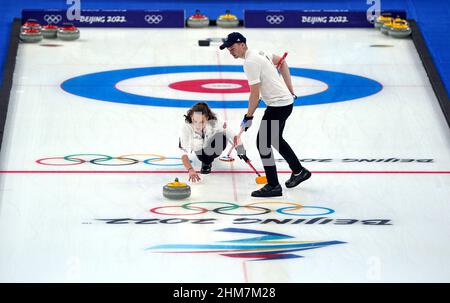 Great Britain's Jennifer Dodds and Bruce Mouat during the Mixed Doubles Bronze Medal match on day four of the Beijing 2022 Winter Olympic Games at the National Aquatics Centre in China. Picture date: Tuesday February 8, 2022. Stock Photo