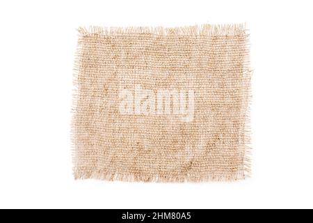 Square piece of beige canvas, sackcloth isolated on white Stock Photo