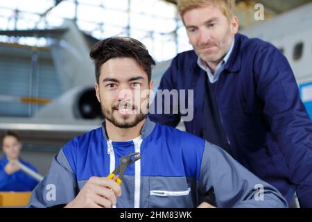 portrait of two flight engineers Stock Photo