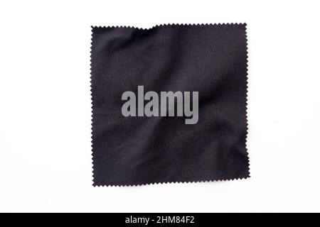 Black square piece of cloth, napkin isolated on white Stock Photo