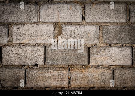 Old Gray concrete construction blocks background Stock Photo