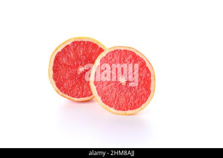 Halves of grapefruit isolated on white background Stock Photo