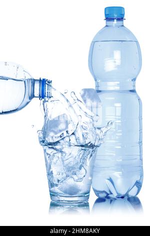 Water pouring into glass ice cube cubes bottle isolated on a white background Stock Photo