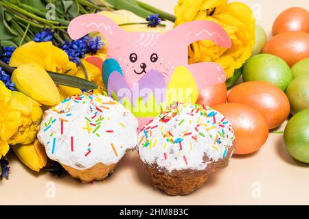 Beautiful Easter card with rabbit paper craft and cakes Stock Photo