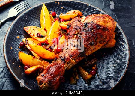 Tasty turkey leg roasted with oranges and spices Stock Photo