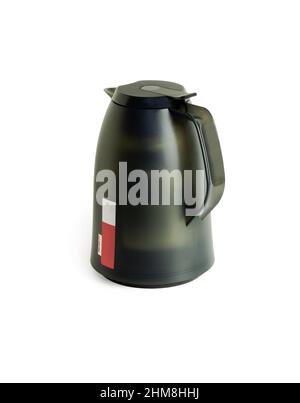 Dark green thermos with a handle. Close-up. Isolated on white background. Stock Photo