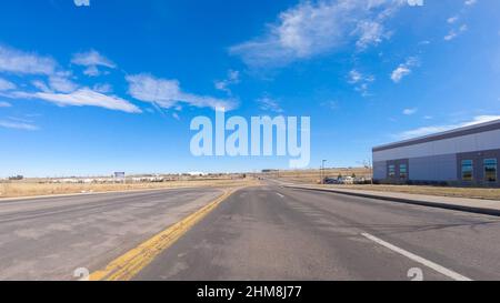 Driving on typical paved roads in suburban America. Stock Photo