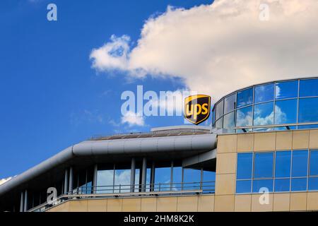 Wroclaw, Poland - Jun 6, 2021: Close up of UPS sign on the building. American multinational package delivery company. Stock Photo