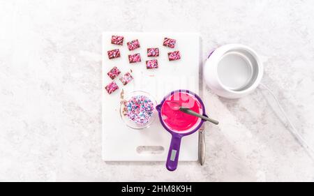 Premium Photo  Flat lay melting pink chocolate melts to make mini pink  chocolates