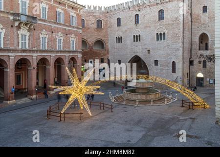 Piazza del Comune square, bright artistic Christmas decorations, Sturinato Fountain, Fabriano, Marche,  Italy, Europe Stock Photo