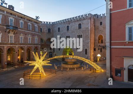 Piazza del Comune square, bright artistic Christmas decorations, Sturinato Fountain, Fabriano, Marche,  Italy, Europe Stock Photo