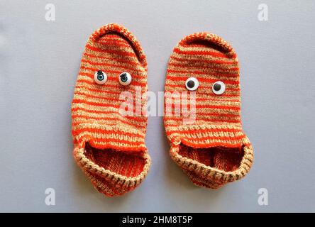 funny doll sock on gray background, hand theater Stock Photo