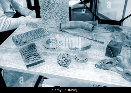 Gray abstract models printed on 3d printer from powder close-up. Stock Photo