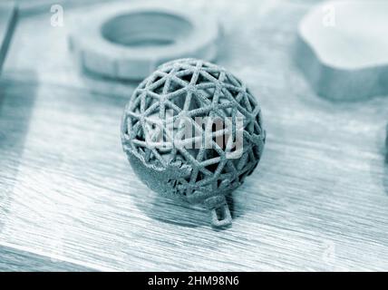 Gray abstract models printed on 3d printer from powder close-up. Stock Photo