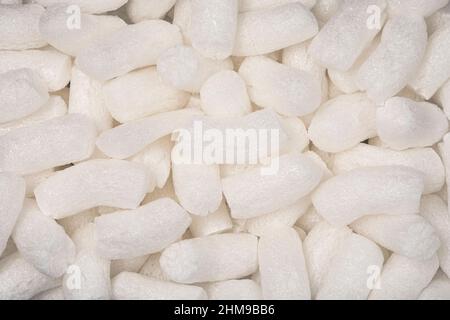 Full frame macro shot of white polystyrene packaging material in pellet shape Stock Photo