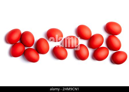 Red Easter eggs isolated on white background. Christian holiday traditional symbol Stock Photo