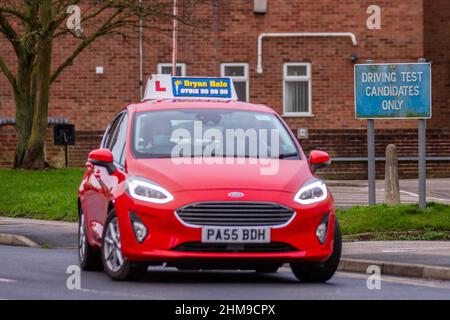 DVSA Driving Test Candidates Only sign, car learner drivers taking their test. 2018 red Ford Fiesta 1499cc diesel 6 speed manual in Southport, Merseyside, UK Stock Photo
