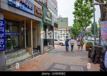 Seoul, South Korea - 1 June 2014, Asian Tourist and local Korean people enjoy walking and shopping around in the shopping street, Seoul, South Korea. Stock Photo