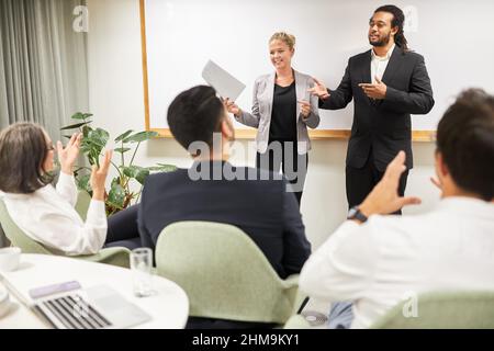 Two speakers in a seminar for further education at a lecture or a presentation Stock Photo
